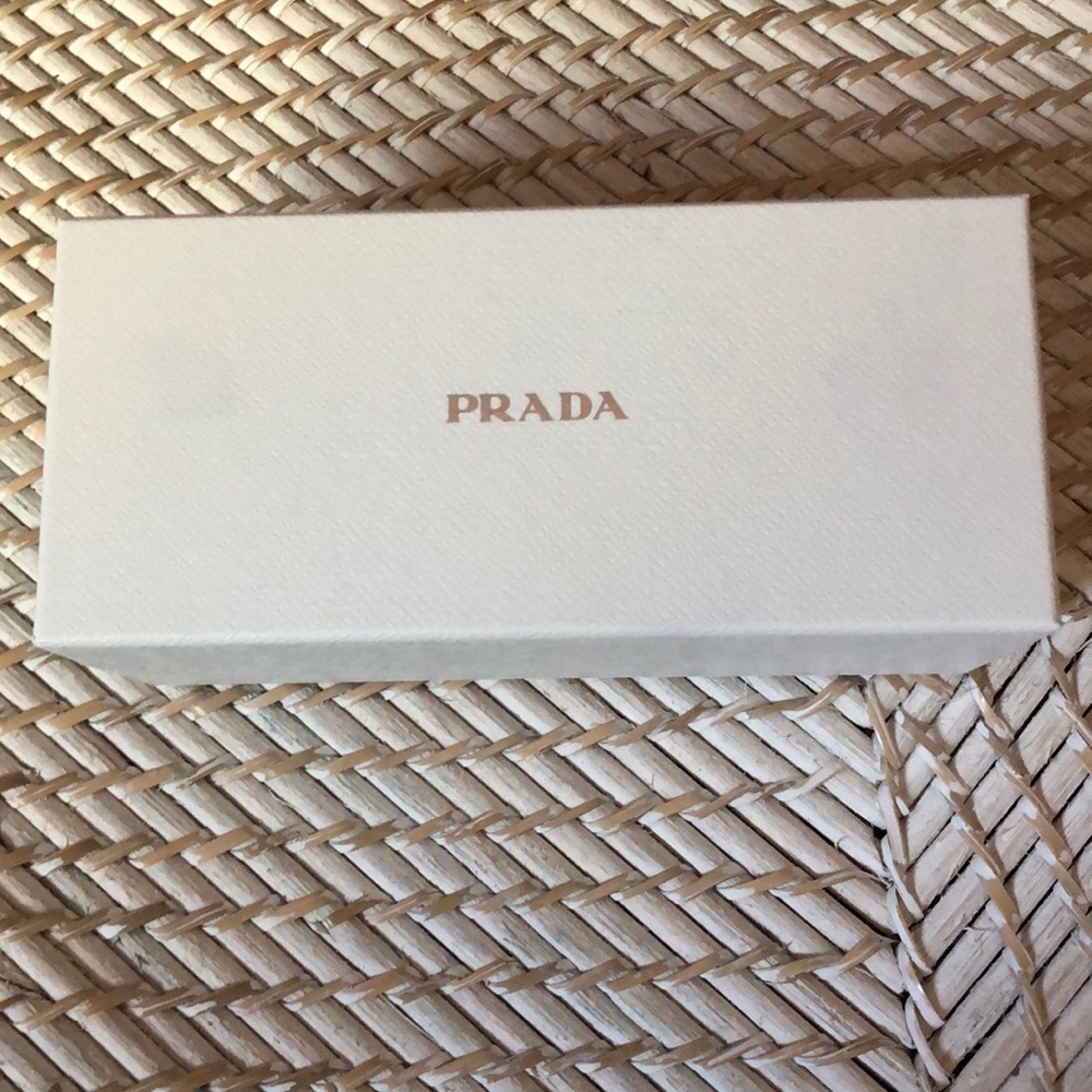 Brand new Prada swirl arm Sunglasses